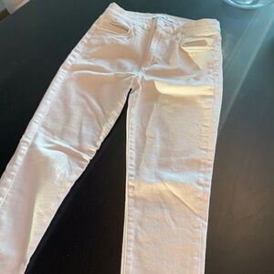 Pair of Joe’s brand white jeans size 28. High rise, skinny, cropped leg style.